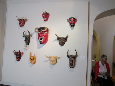nice lady with scary masks at the Pueblo Museum