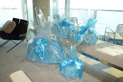 Happy birthday! I lean towards simple, beautiful wrapping--just a little tissue, lots of cellophane, and yards of ribbon to ready these special gifts.