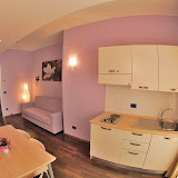 Cucina-soggiorno con divano-letto / Kitchen-living room with sofa bed fisheye