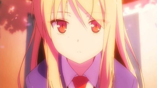 Mashiro staring blankly forward up close in the reddish hue of sunset