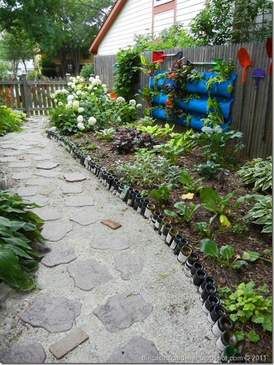 wine bottle path and wall garden