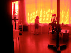 It looked like Corinne was in a toaster oven when I took this shot through the lens. I love how the sunlight makes the curtains glow bright yellow.