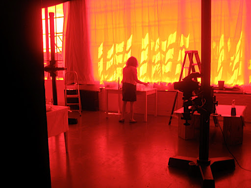 It looked like Corinne was in a toaster oven when I took this shot through the lens. I love how the sunlight makes the curtains glow bright yellow.
