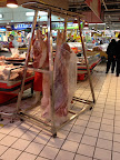 Fresh pork at the grocery store. Tell them what cut you want and they hack it off.