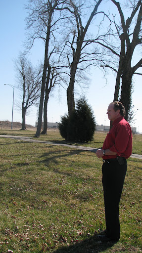 Greene County Presiding Commissioner Dave Coonrod stands in the Alms House Cemetery. (Photo credit: Jennifer Moore)