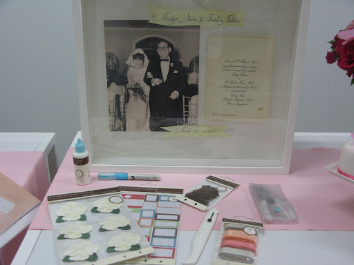 Just a few items from our Martha Stewart Crafts line available at Michael's, and one of Darcy's scrap boxes. This one features a wedding photo and invitation from her parents' wedding.