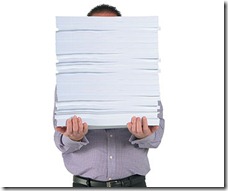 man-with-pile-of-paper1
