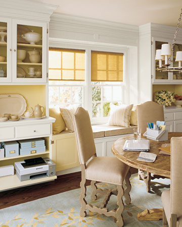 Dining room shelving doubles as a home office.