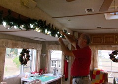 Terry Puts Up the Garland - needs both hands eh so no eggnog.