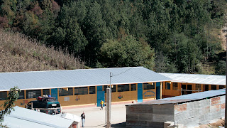 First Sienna Project  Guatemala  school in Aqua Vita Canton, Guatemala (rear) and addition at left. Our van at left and Ira at center. Sienna Project 2011 Guatemala trip to help build school in Palanquix, Solala, Guatemala. Photos by TOM HART