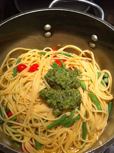 Adding the pesto Adding the pesto