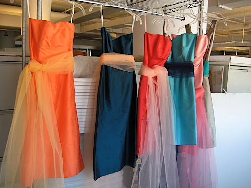 Our bridesmaids dresses and tulle sashes. We hung them up and tried some color combos before the shoot.