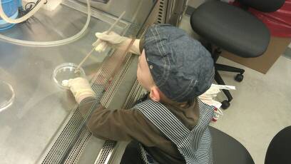 Andy scraping cells in the hood