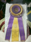 Take a gander at the ribbon!  Best of Breed!  I am determined to get one of those of my own someday!