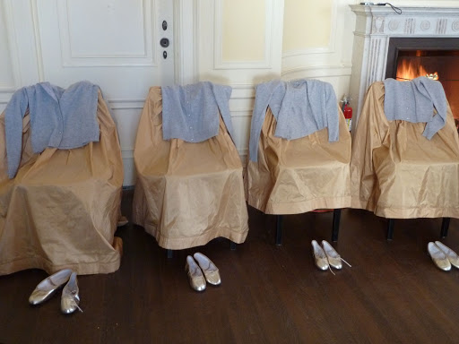 I loved how the girls' outfits were set out on chairs in the bridal suite.