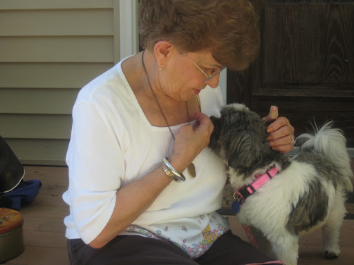 ...on roses...
(or in this case...Rosie! Photo of Julie as she adopted Rosie)
