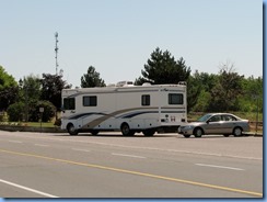 5941 Hwy 7 Havelock - motorhome and car parked by train tracks
