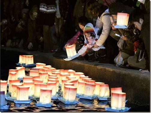 Paper lanterns, lit to mourn March 11, 2011 earthquake and tsunami victims, are released into the sea in Yamada town, Iwate Prefecture March 10, 2012, a day before the disaster's one-year anniversary. REUTERS/Kyodo