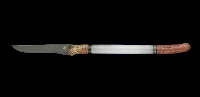Pen knife | Origin:  Turkey? | Period: 18th-19th century  Ottoman period | Details:  Not Available | Type: Hardstone (either quartz or jade) and either tinted ivory or coral, metal | Size: H: 19.8  W: 1.2   D: 0.9  cm | Museum Code: S1991.5 | Photograph and description taken from Freer and the Sackler (Smithsonian) Museums.