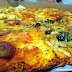 Closeup of Yellow Cab Pizza Co.'s Four Seasons Pizz