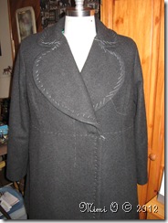 Diagonal basting through all layers on the front, lapels and upper collar.