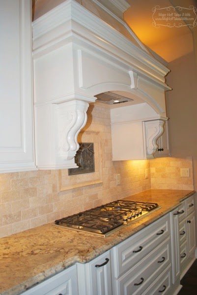 Gorgeous corbel arched kitchen vent above stovetop.jpg Gorgeous corbel arched kitchen vent above stovetop