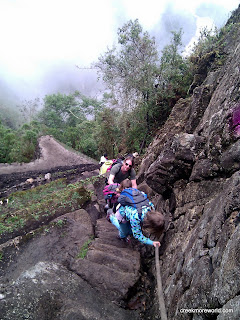 Nearly vertical stone stairs make going back down worse than going up.