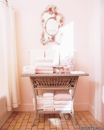 An eclectic mix of high and low: Venetian mirror and wicker.