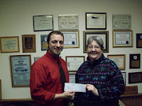 KCII’s General Manager Joe Nichols with Rose Fisher of Kalona