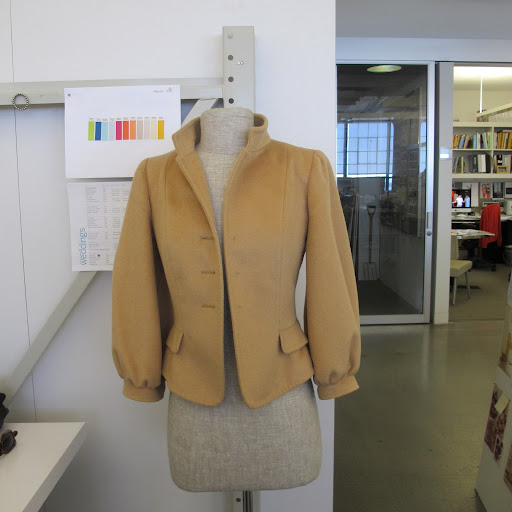 This dress form makes a perfect coat rack. People say they know if I am here if they see something hanging on the form.