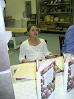 John’s daughter, Nola, peruses the cookbook.