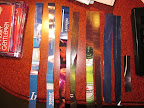 You start by picking pages in colors that you like and cutting strips of various sizes. For the dudes, I cut up pages with beer and liquor ads.