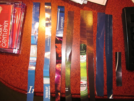 You start by picking pages in colors that you like and cutting strips of various sizes. For the dudes, I cut up pages with beer and liquor ads. You start by picking pages in colors that you like and cutting strips of various sizes. For the dudes, I cut up pages with beer and liquor ads.