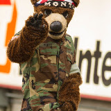 Monte bares his bear fur and claws the camera in a suggestive manner during Saturday's game.  

Washington-Grizzly Stadium in Missoula, Mont., October 27th, 2012.