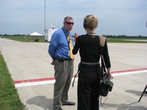 Gary Cyr, director of aviation at the Springfield-Branson National Airport, is interviewed by KSMU's Jennifer Moore. Cyr said the drill gives all agencies involved a chance to check their various responses, and to make sure they can all communicate with one another.