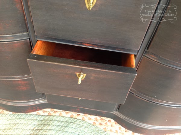 drawer close up black dresser red accents.jpg Drawer close up black dresser red accents