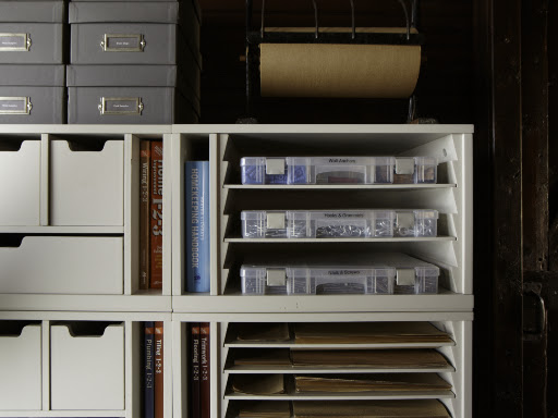 Compartmentalized cases are a must for holding small pieces.  These cases from The Container Store (containerstore.com) are treated so they also inhibit tarnish.