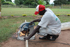 Workman using 450mm cut-off-saw