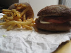 The burger on potato-onion brioche bread and fries from Frites n Meats.