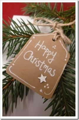 Evergreen christmas place setting with tag. Evergreen christmas place setting with tag.
