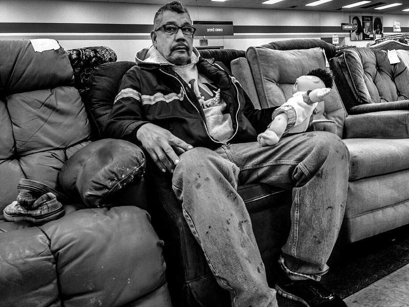 man holding a doll