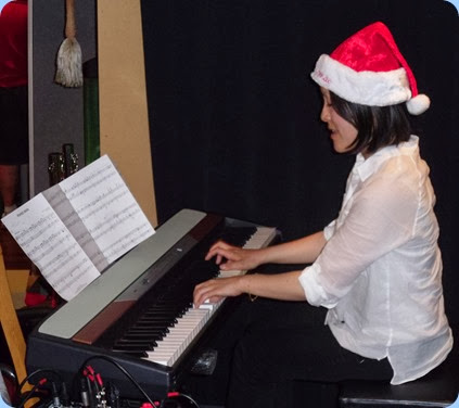 Kuniko Nakatani giving a 30 minute recital with lots of great music including some Christmas songs. Kuniko is playing the Club's Korg SP-250 digital piano.