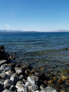 On our last morning there we took a walk along the shoreline with all the morning Argentinians. The water was so clear and beautiful. They catch a trout and a Salmon trout in these waters - most restaurants served steak and lake food.