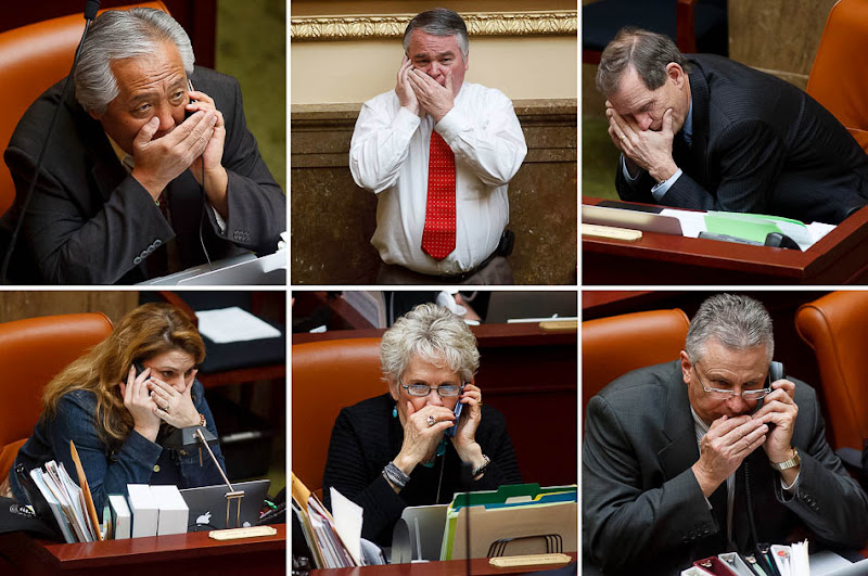 Legislators talking on phones in the House Chamber Friday, February 8, 2013 in Salt Lake City. Clockwise from top left, Rep. Curtis Oda, R-Clearfield, Rep. Dixon Pitcher, R-Ogden, Rep. Brad Dee, R-Ogden, Rep. Jack Draxler, R-Logan, Rep. Carol Spackman Moss, D-Salt Lake City and Rep. Jennifer Seelig, D-Salt Lake City.