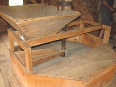 Cape Cod windmill upstairs with grain storage bins Cape Cod windmill upstairs with grain storage bins