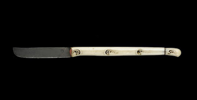 Pen knife | Origin:  Turkey | Period: 18th-19th century  Ottoman period | Details:  Not Available | Type: Walrus ivory, red inlay (possibly coral), metal | Size: H: 19.4  W: 1.2   D: 0.9  cm | Museum Code: S1991.8 | Photograph and description taken from Freer and the Sackler (Smithsonian) Museums.