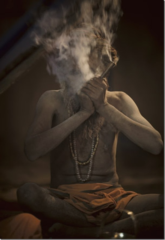  Naga sadhus smoking a charas. Ard Kumb Mela in Allahabad 2007