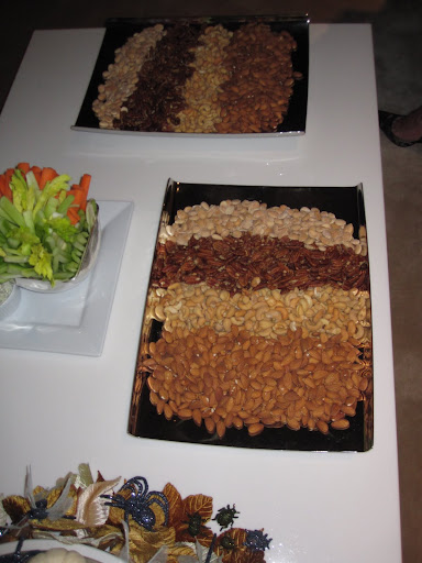 There is a pretty way to display different types of nuts -- on a platter all lined up.