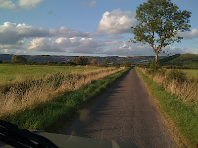 Down on to the Somerset Levels... the flat land contrasts with the Mendip Hills in the background