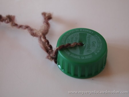 Bottle Cap Beaded Door - Tying Caps onto Yarn Bottle Cap Beaded Door - Tying Caps onto Yarn